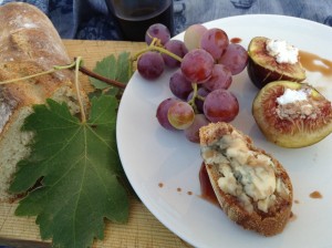 mosto cotto on blue cheese and sourdough bread, and on figs stuffed with ricotta